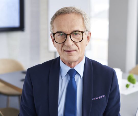 2-portrait-of-confident-businessman-in-conference-ro-TXX6Y45.jpg
